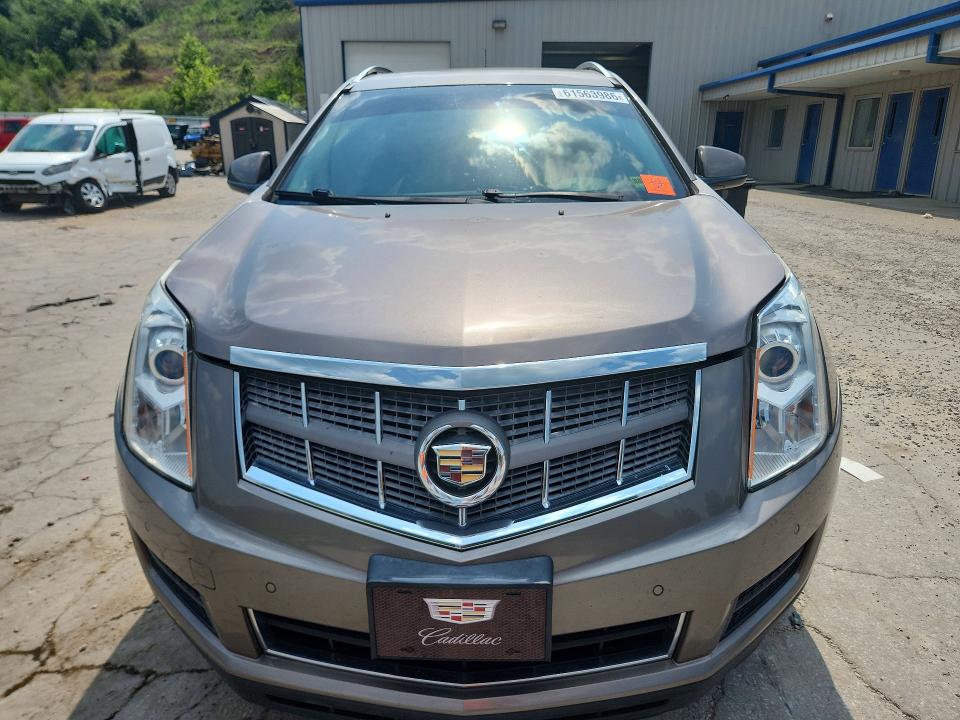61563986 :رقم المزاد ، 3GYFNDEY1BS625126 vin ، 2011 Cadillac Srx مزاد بيع