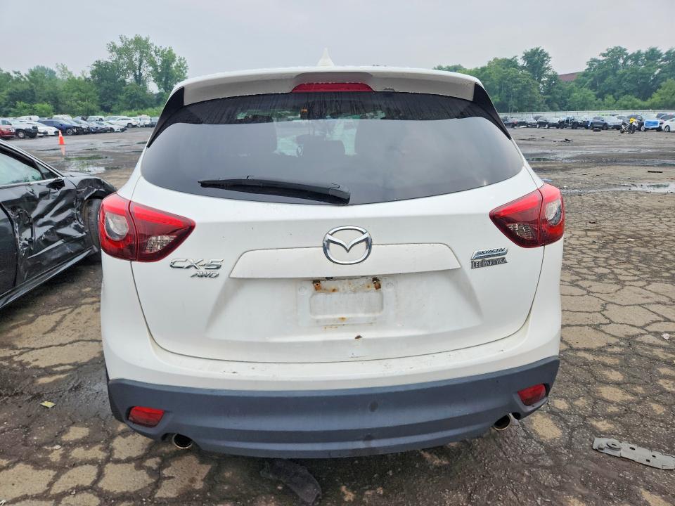 60930976 :رقم المزاد ، JM3KE4DY3G0712554 vin ، 2016 Mazda Cx-5 مزاد بيع