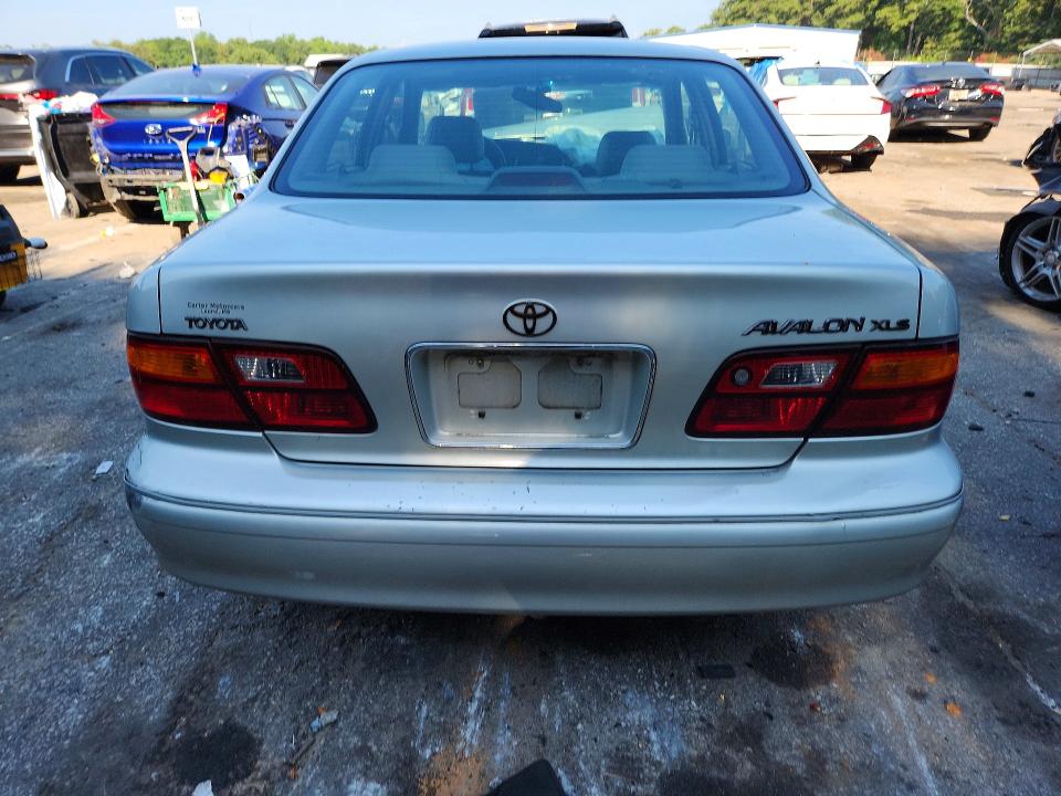 60141266 :رقم المزاد ، 4T1BF18B8XU332883 vin ، 1999 Toyota Avalon مزاد بيع