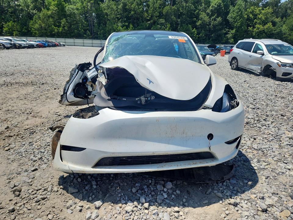 Продаж на аукціоні авто 2023 Tesla Model Y, vin: 7SAYGDEE7PF704317, номер лоту: 63040306