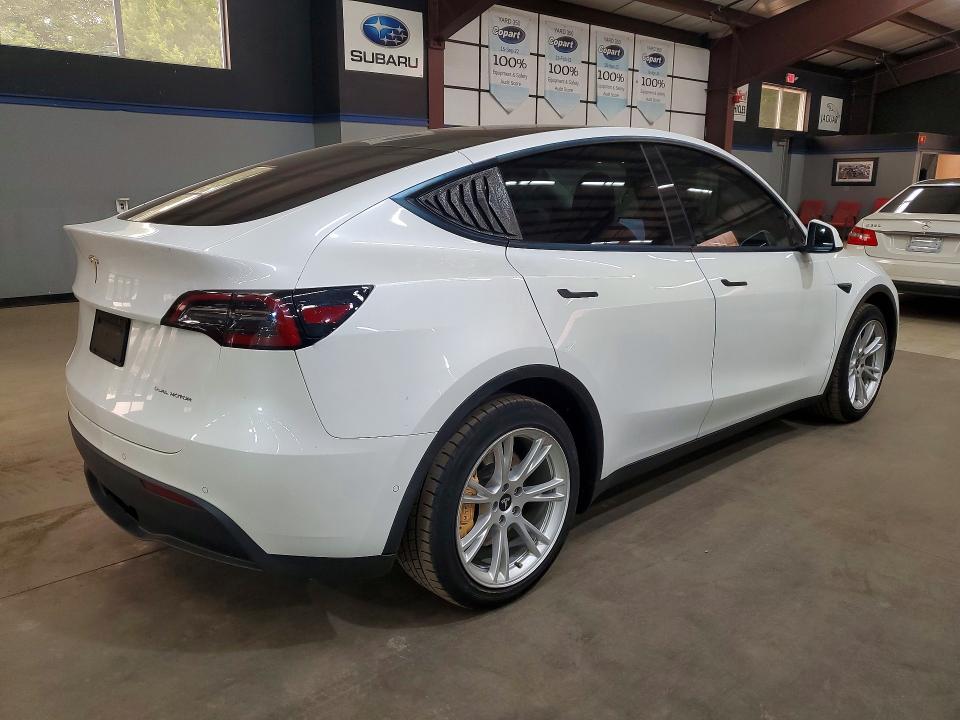 Продаж на аукціоні авто 2021 Tesla Model Y, vin: 5YJYGDEEXMF180914, номер лоту: 60773126