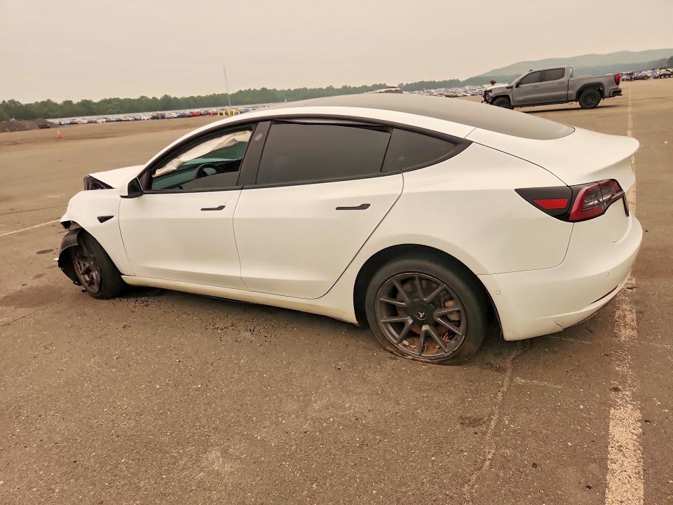 Продажа на аукционе авто 2021 Tesla Model 3, vin: 5YJ3E1EA4MF915950, номер лота: 61413226