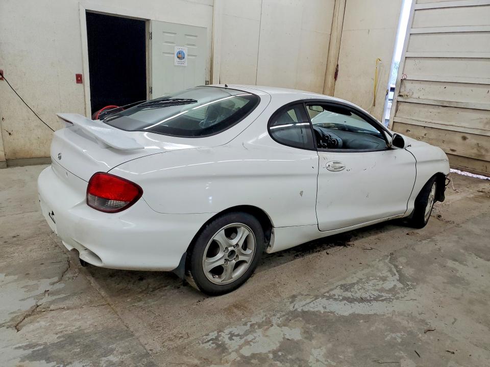 Продажа на аукционе авто 2001 Hyundai Tiburon, vin: KMHJG35FX1U228785, номер лота: 59911736