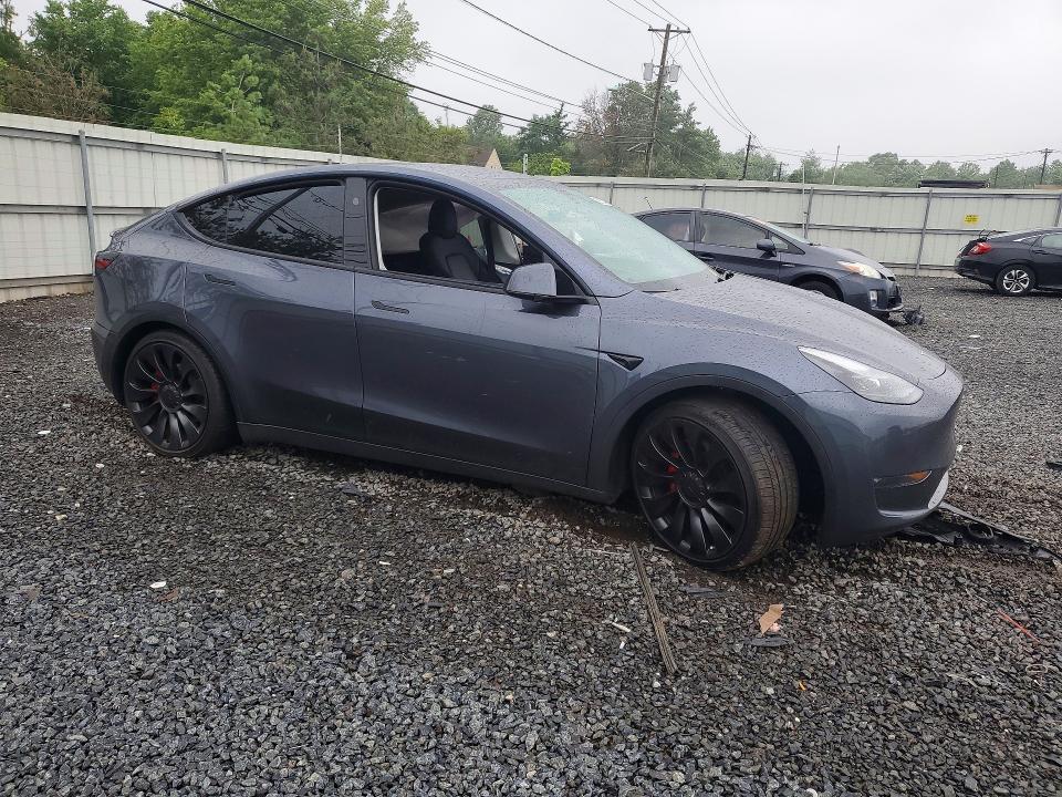 60009976 :رقم المزاد ، 7SAYGDEF0PF858571 vin ، 2023 Tesla Model Y مزاد بيع