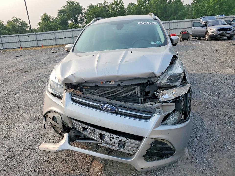 Продажа на аукционе авто 2016 Ford Escape, vin: 1FMCU0JX5GUC72412, номер лота: 61129786