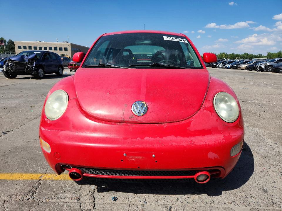 61820626 :رقم المزاد ، 3VWCC21C5XM447808 vin ، 1999 Volkswagen New Beetle مزاد بيع