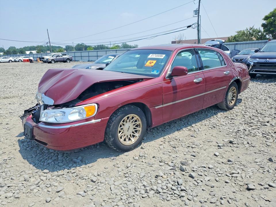 Продаж на аукціоні авто 1999 Lincoln Town Car, vin: 1LNHM82W8XY675402, номер лоту: 61745696