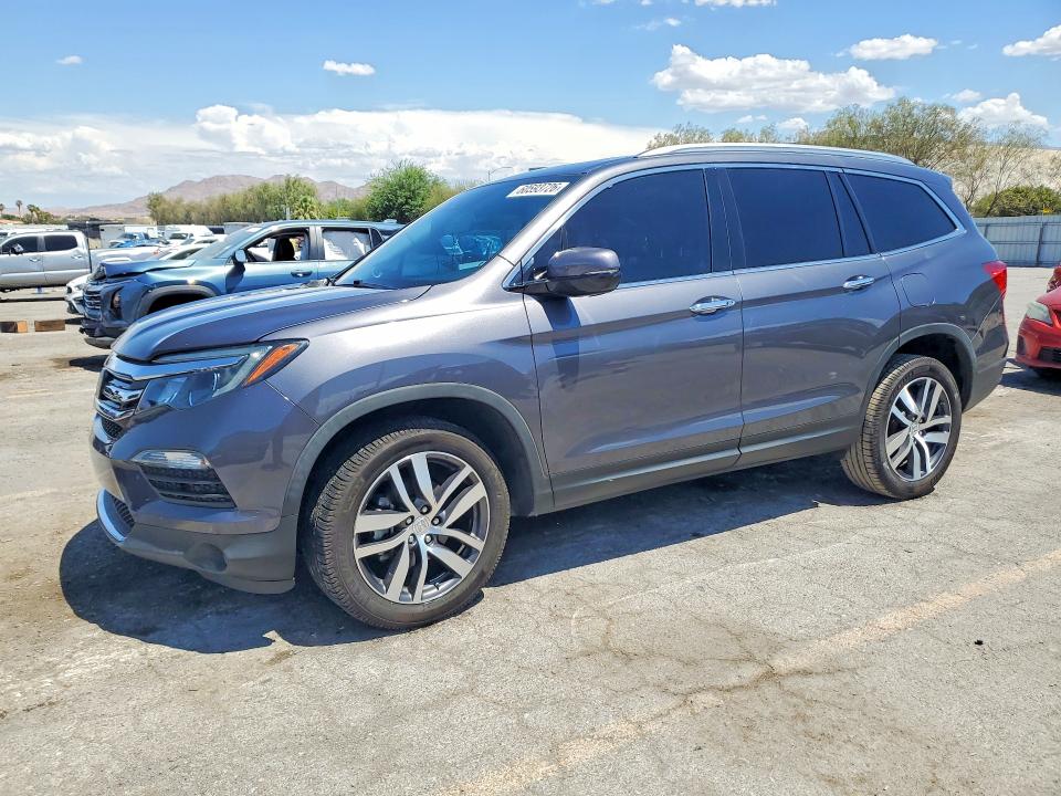 60593726 :رقم المزاد ، 5FNYF6H96JB051772 vin ، 2018 Honda Pilot مزاد بيع