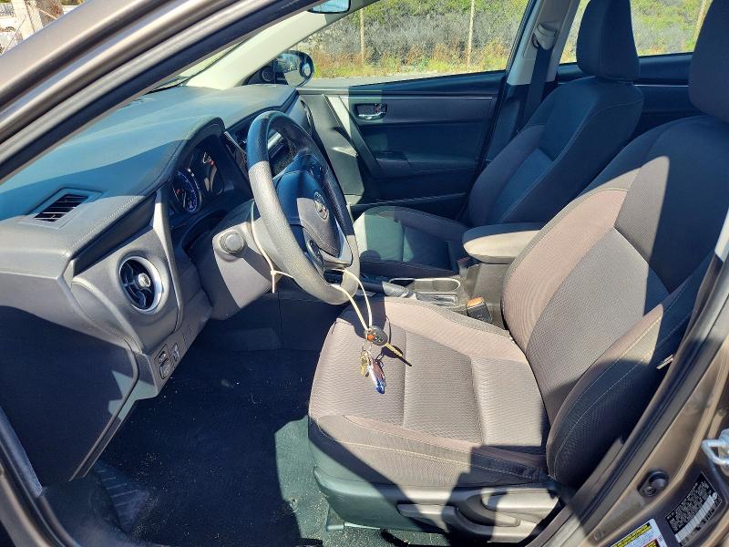 60892866 :رقم المزاد ، 5YFBURHE7JP771645 vin ، 2018 Toyota Corolla مزاد بيع
