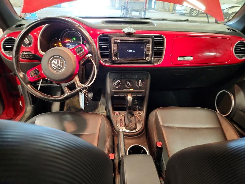 63038886 :رقم المزاد ، 3VWJX7AT5EM631295 vin ، 2014 Volkswagen Beetle مزاد بيع