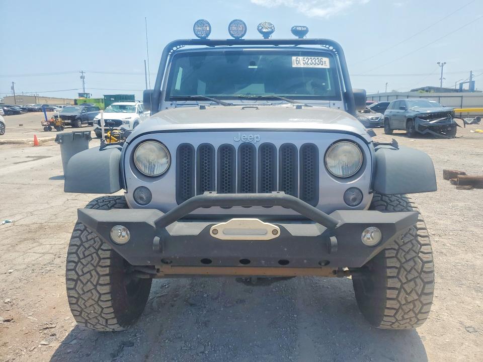 60523336 :رقم المزاد ، 1C4BJWDG4EL261136 vin ، 2014 Jeep Wrangler Unlimited مزاد بيع