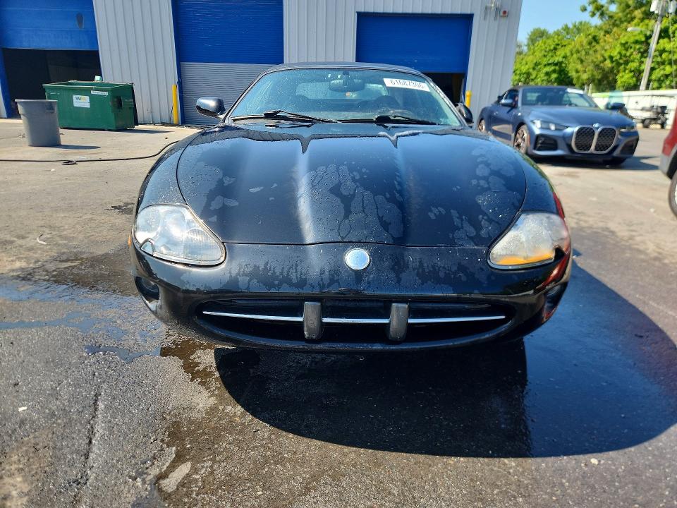 61687306 :رقم المزاد ، SAJGX204XXC041884 vin ، 1999 Jaguar Xk8 مزاد بيع