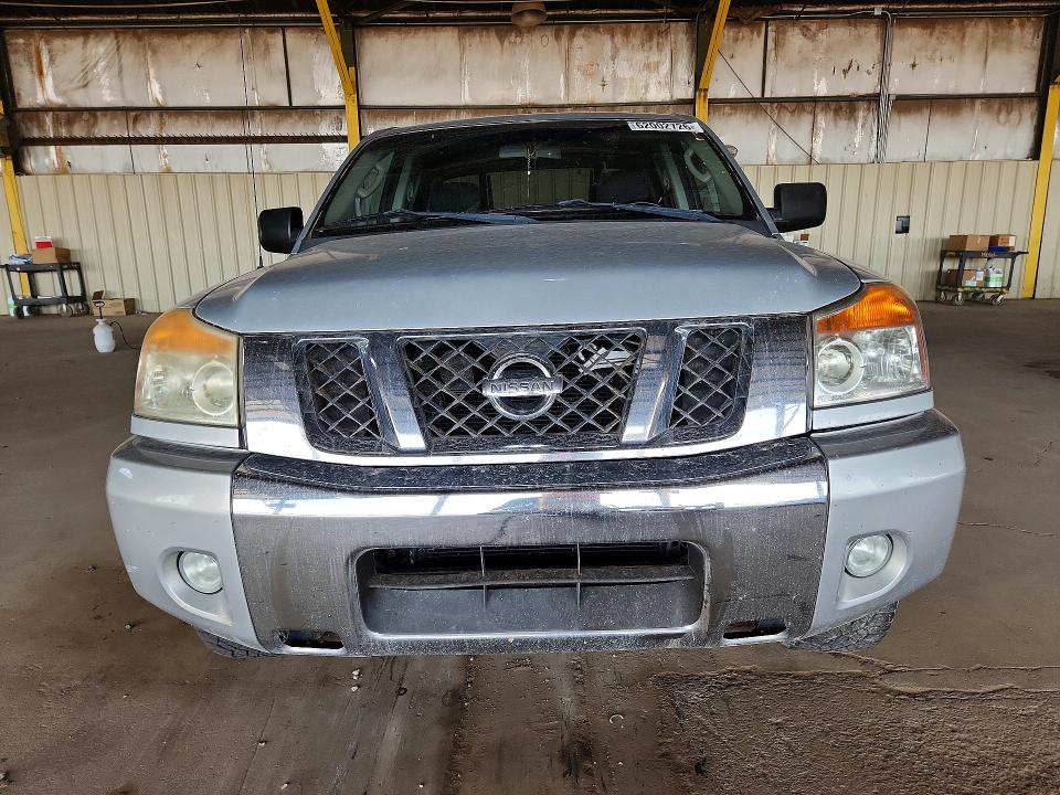 62002726 :رقم المزاد ، 1N6AA0ED7AN313464 vin ، 2010 Nissan Titan مزاد بيع