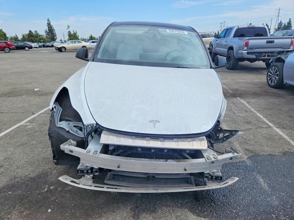 60875256 :رقم المزاد ، 7SAYGDEEXPA104968 vin ، 2023 Tesla Model Y مزاد بيع