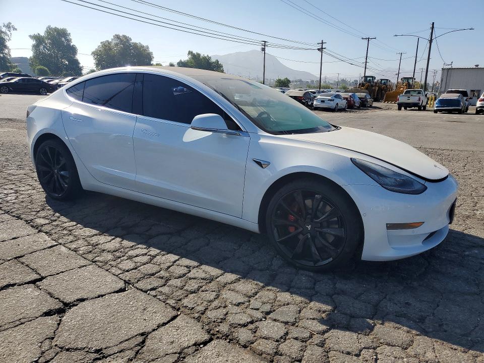 Продажа на аукционе авто 2018 Tesla Model 3, vin: 5YJ3E1EB1JF106507, номер лота: 63165656