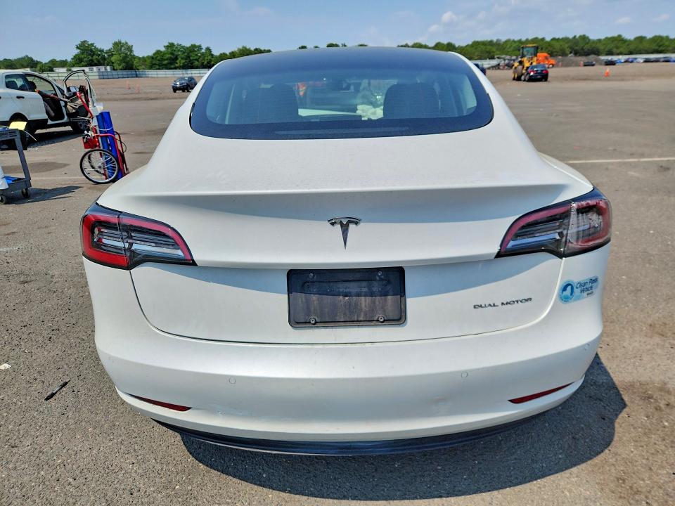 62009356 :رقم المزاد ، 5YJ3E1EB4MF051037 vin ، 2021 Tesla Model 3 مزاد بيع