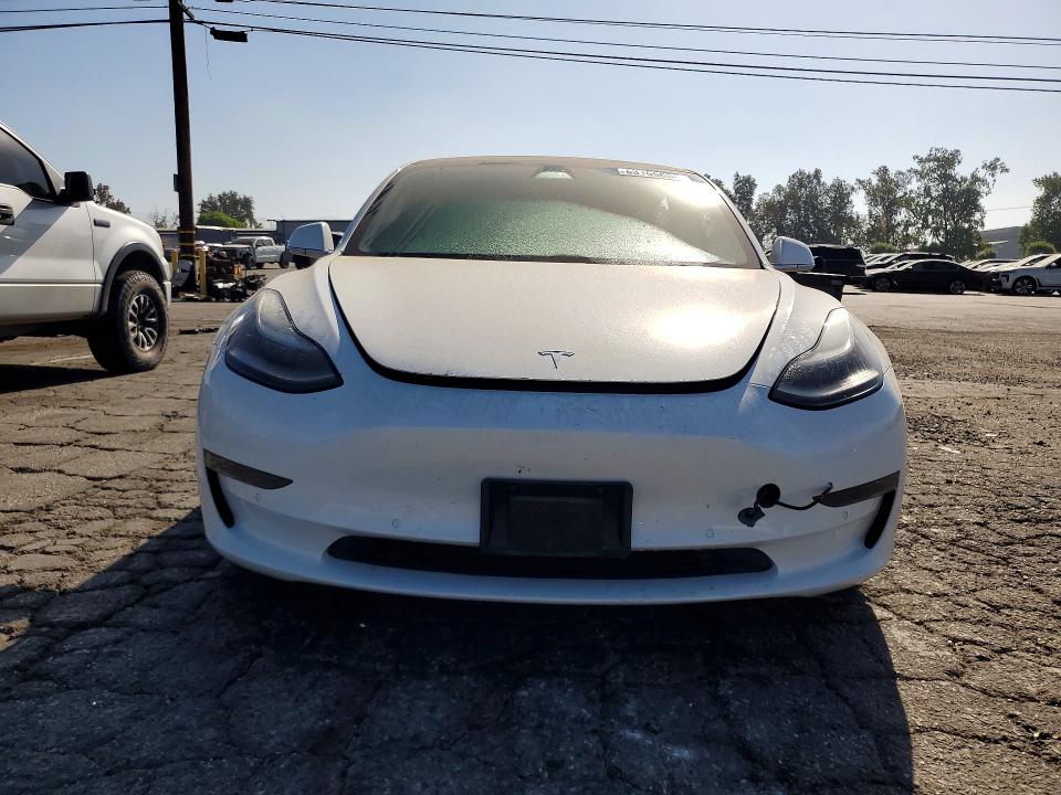 Продажа на аукционе авто 2018 Tesla Model 3, vin: 5YJ3E1EB1JF106507, номер лота: 63165656