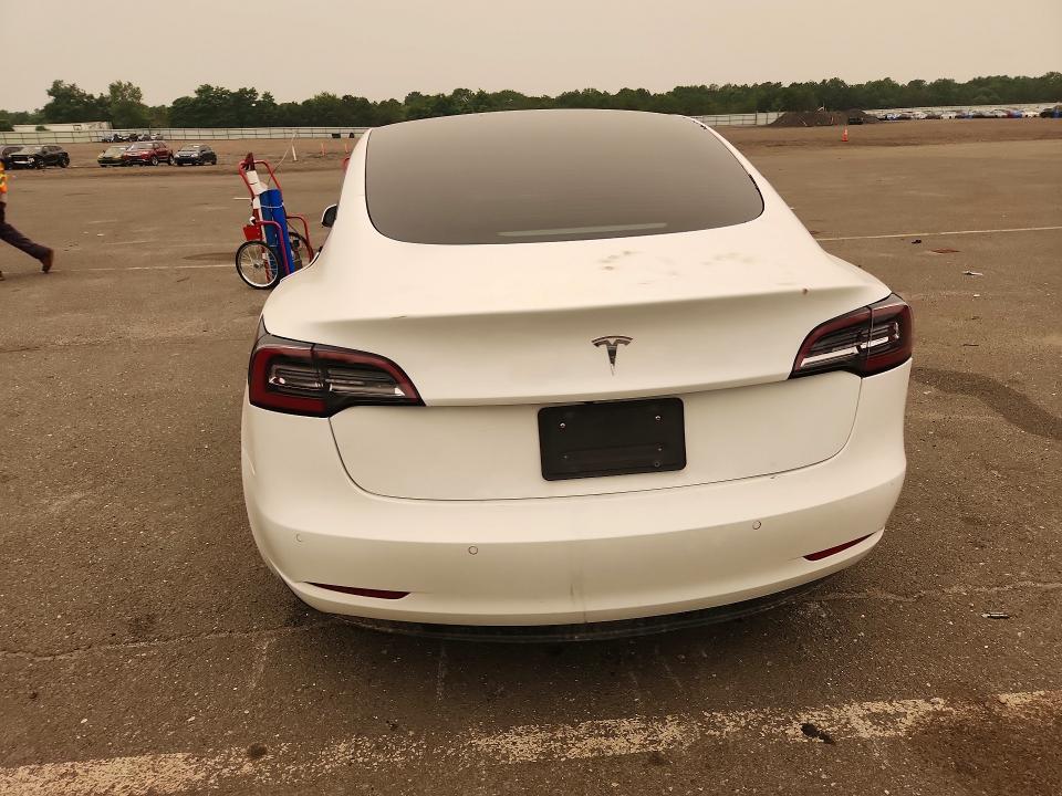 Продажа на аукционе авто 2021 Tesla Model 3, vin: 5YJ3E1EA4MF915950, номер лота: 61413226