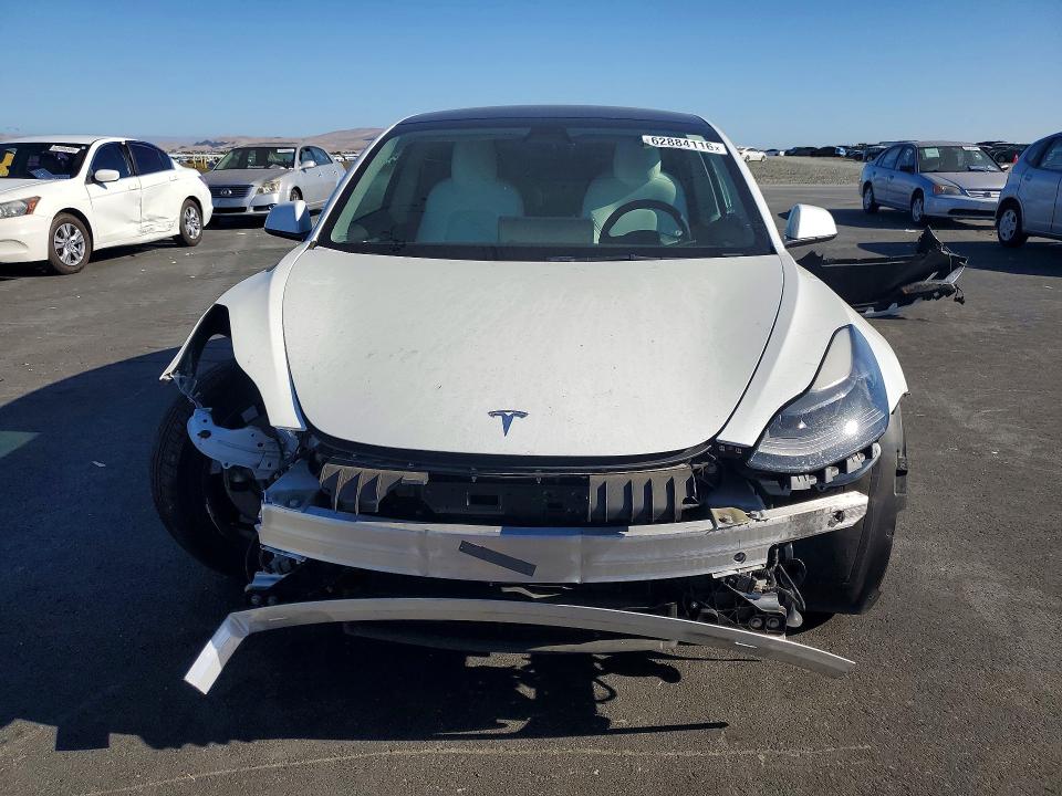 Продажа на аукционе авто 2021 Tesla Model 3, vin: 5YJ3E1EA2MF096694, номер лота: 62884116