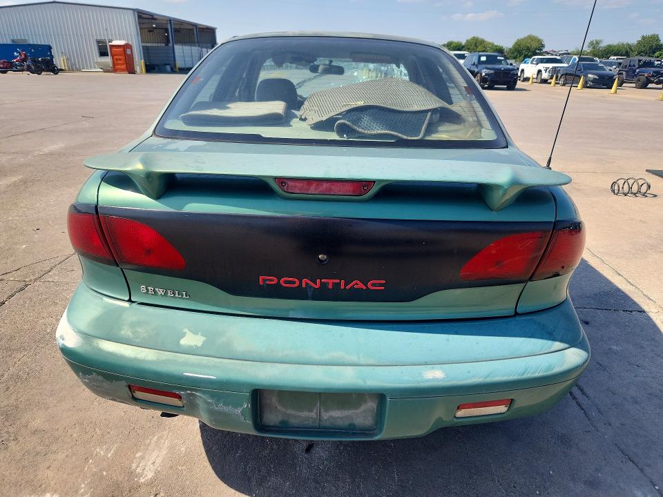 61909786 :رقم المزاد ، 3G2JB5241XS801944 vin ، 1999 Pontiac Sunfire مزاد بيع