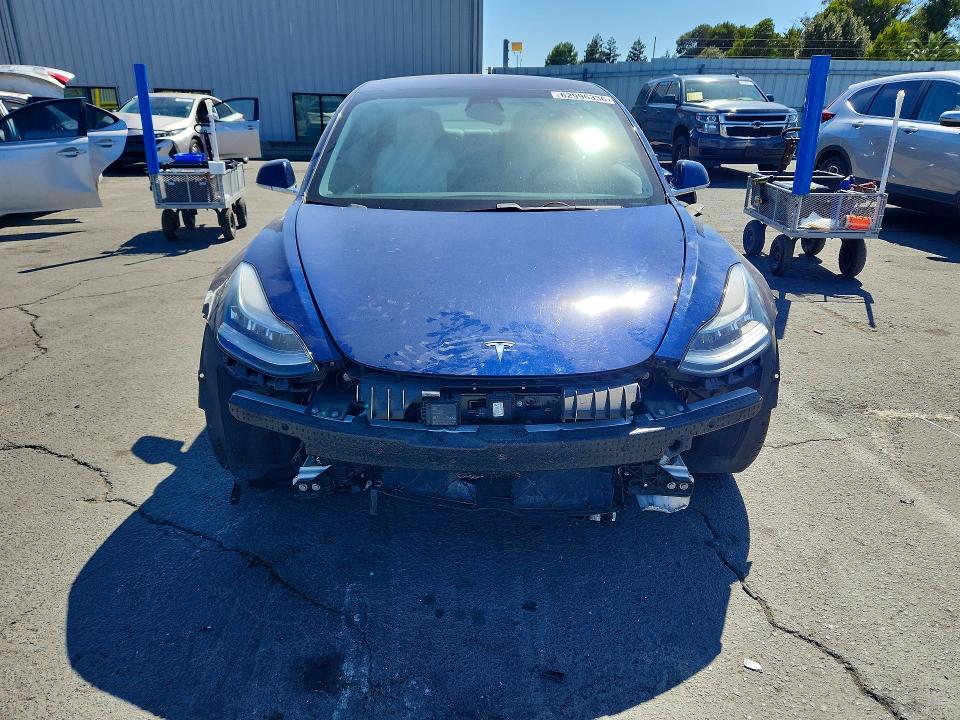 Продажа на аукционе авто 2018 Tesla Model 3, vin: 5YJ3E1EBXJF080716, номер лота: 62996336
