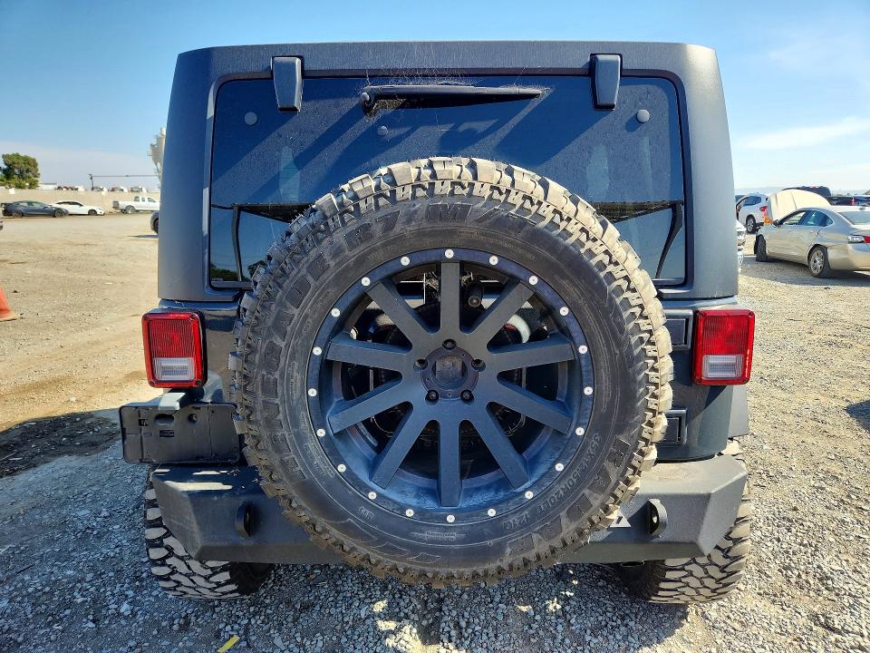 62104336 :رقم المزاد ، 1C4BJWDG8GL318909 vin ، 2016 Jeep Wrangler Unlimited مزاد بيع