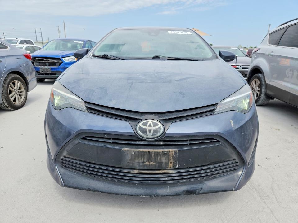62979406 :رقم المزاد ، 5YFBURHE9KP859498 vin ، 2019 Toyota Corolla مزاد بيع