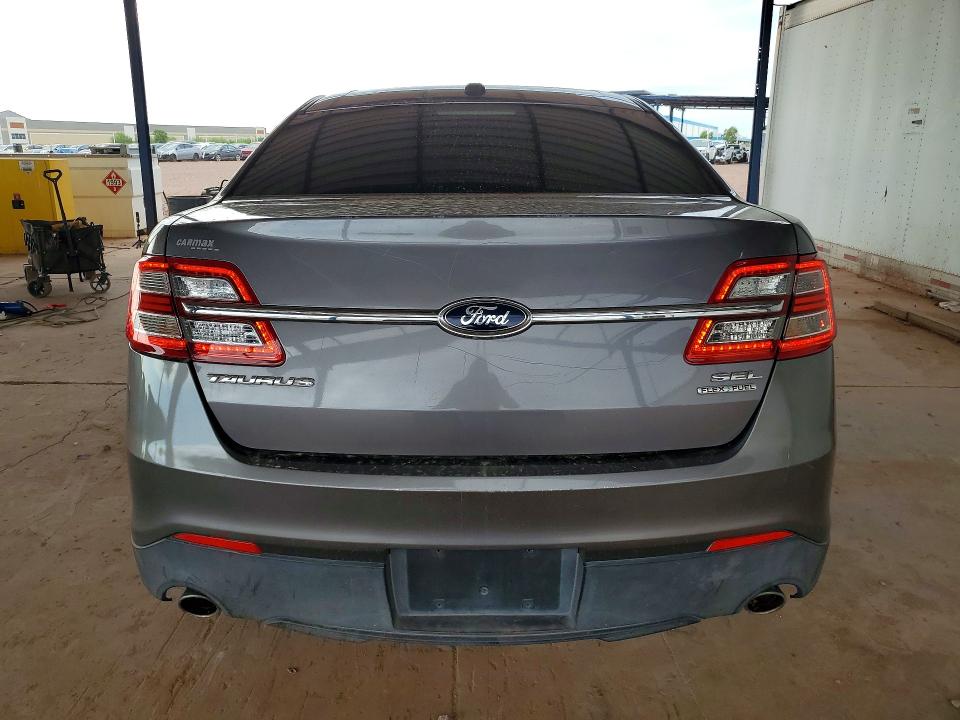 61803316 :رقم المزاد ، 1FAHP2E85EG100818 vin ، 2014 Ford Taurus مزاد بيع