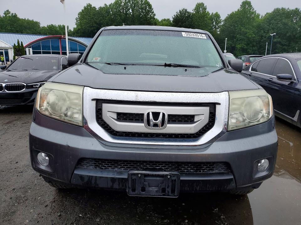 59243516 :رقم المزاد ، 5FNYF4H53BB093318 vin ، 2011 Honda Pilot مزاد بيع