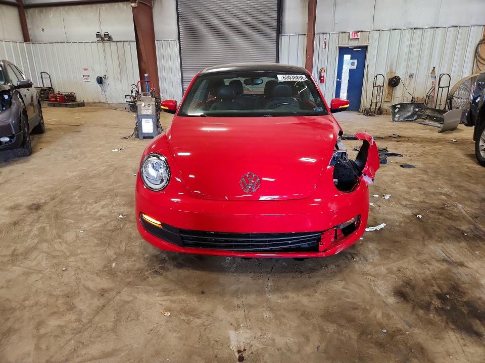 63038886 :رقم المزاد ، 3VWJX7AT5EM631295 vin ، 2014 Volkswagen Beetle مزاد بيع
