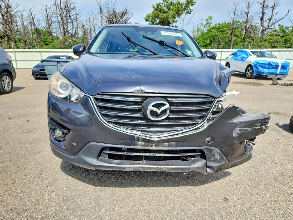 2016 Mazda Cx-5 მანქანა იყიდება აუქციონზე, vin: JM3KE4DY3G0743044, აუქციონის ნომერი: 60530666