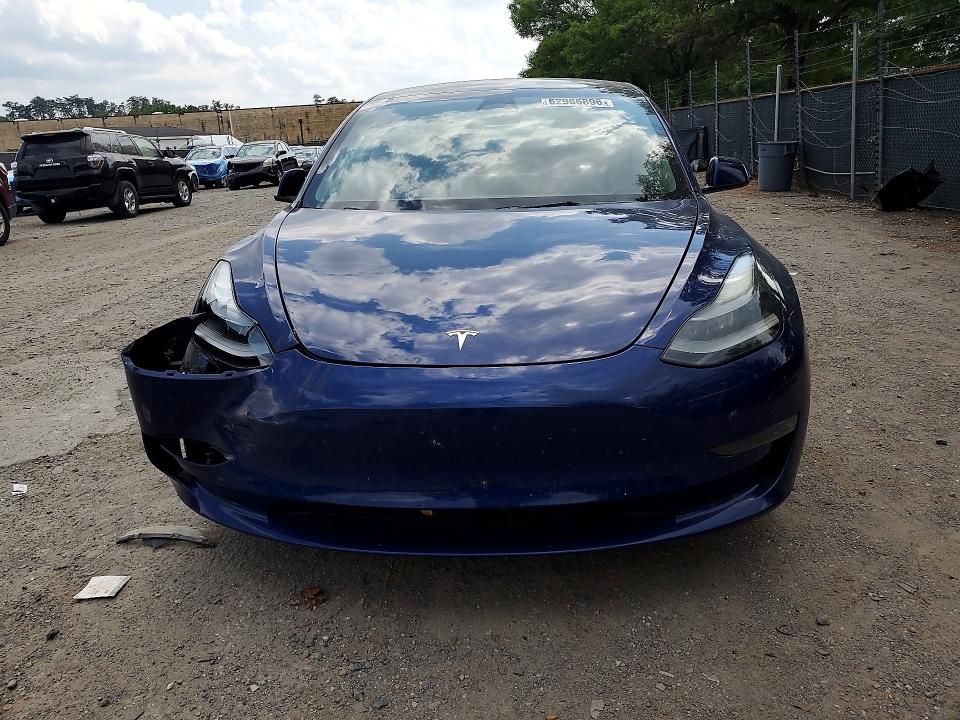 Продажа на аукционе авто 2023 Tesla Model 3, vin: 5YJ3E1EA4PF656090, номер лота: 62966896