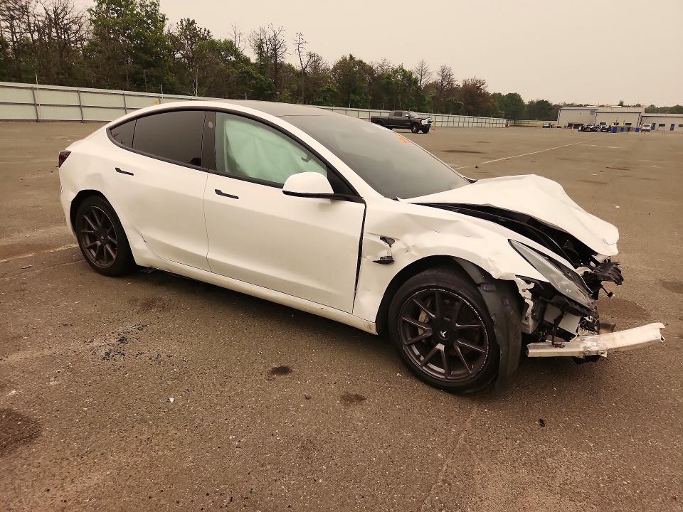 Продажа на аукционе авто 2021 Tesla Model 3, vin: 5YJ3E1EA4MF915950, номер лота: 61413226