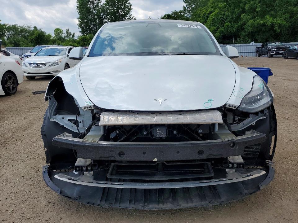 60137526 :رقم المزاد ، 5YJYGDED3MF114146 vin ، 2021 Tesla Model Y مزاد بيع