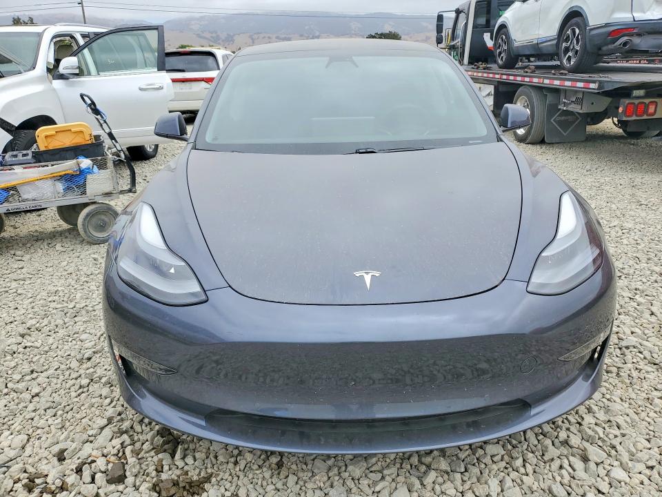 Продажа на аукционе авто 2021 Tesla Model 3, vin: 5YJ3E1EAXMF998770, номер лота: 58843206