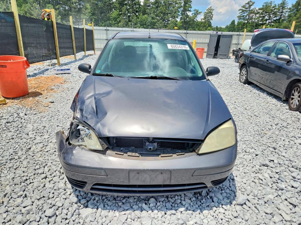 60834316 :رقم المزاد ، 1FAFP34N17W164349 vin ، 2007 Ford Focus مزاد بيع