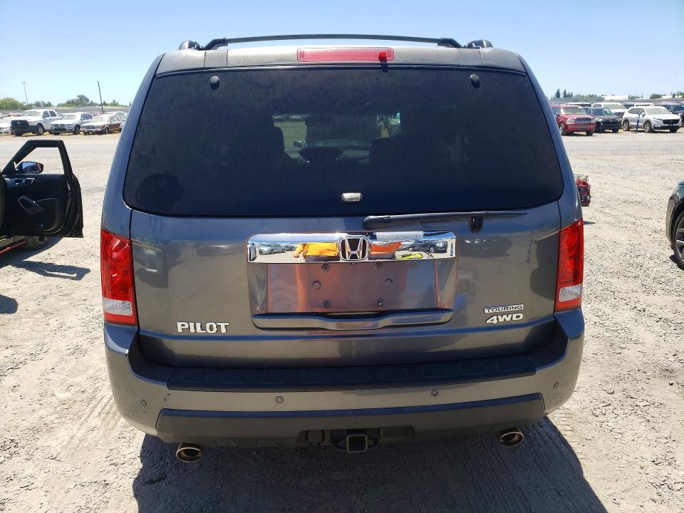 61064056 :رقم المزاد ، 5FNYF4H97AB022396 vin ، 2010 Honda Pilot مزاد بيع