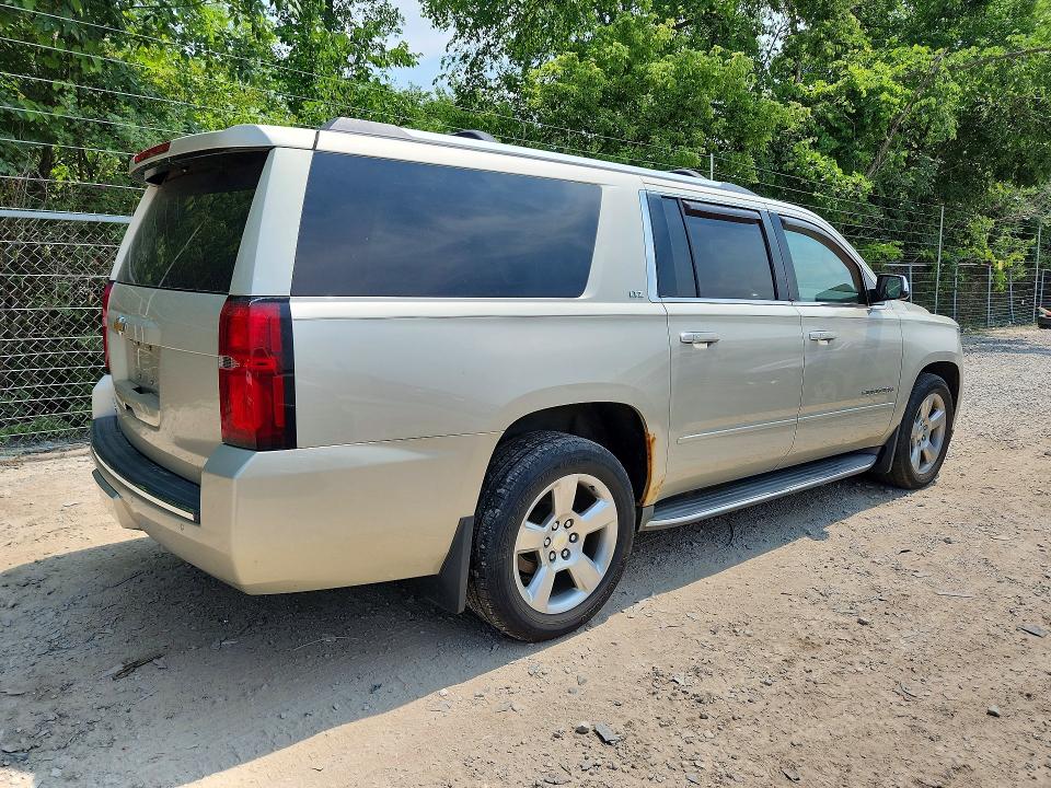 Продажа на аукционе авто 2015 Chevrolet Suburban, vin: 1GNSKKKCXFR507523, номер лота: 61170186