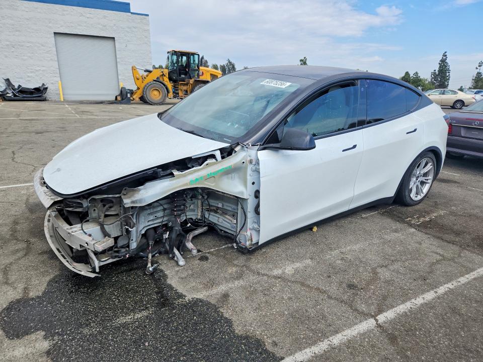60875256 :رقم المزاد ، 7SAYGDEEXPA104968 vin ، 2023 Tesla Model Y مزاد بيع