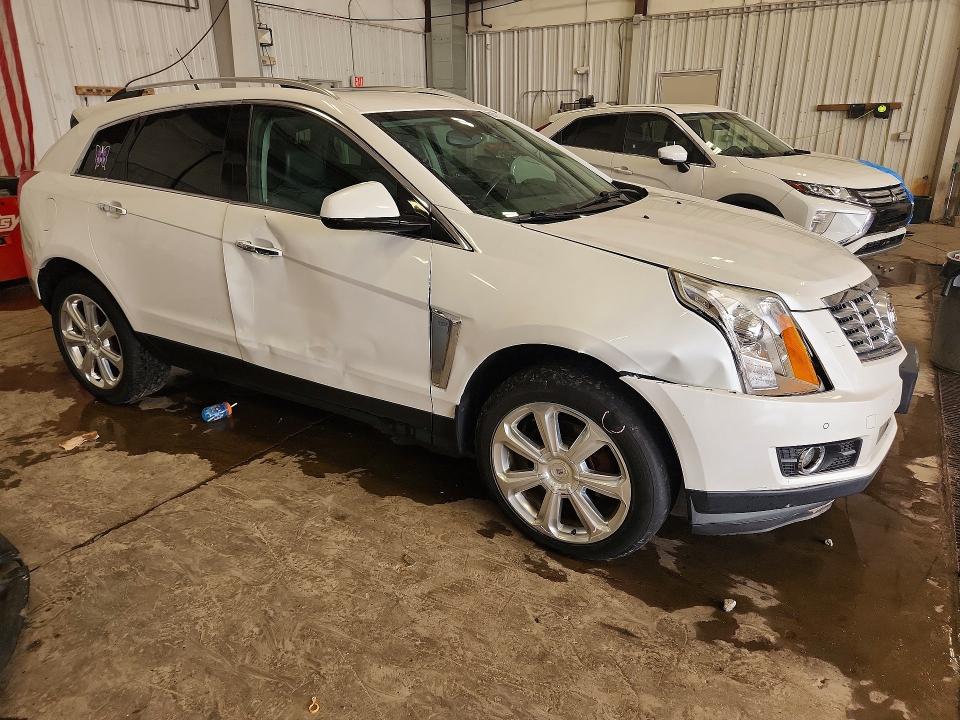 60377736 :رقم المزاد ، 3GYFNFE33ES577049 vin ، 2014 Cadillac Srx مزاد بيع
