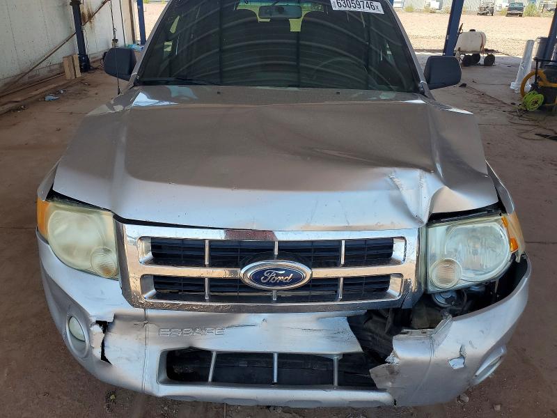 63059746 :رقم المزاد ، 1FMCU0DG5BKA33555 vin ، 2011 Ford Escape مزاد بيع
