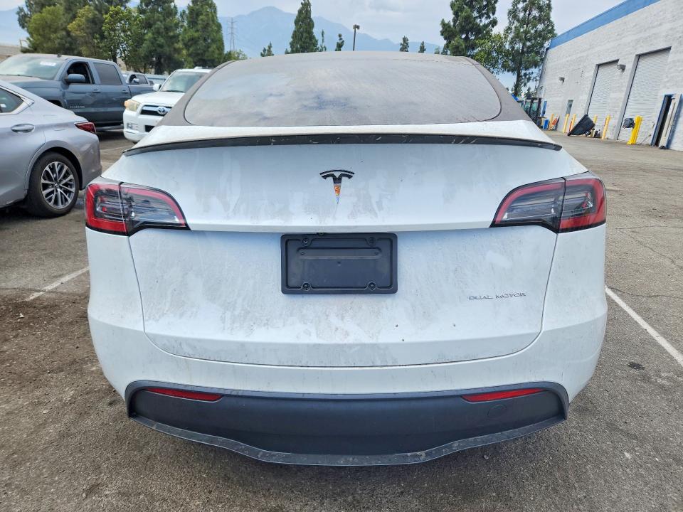 60875256 :رقم المزاد ، 7SAYGDEEXPA104968 vin ، 2023 Tesla Model Y مزاد بيع