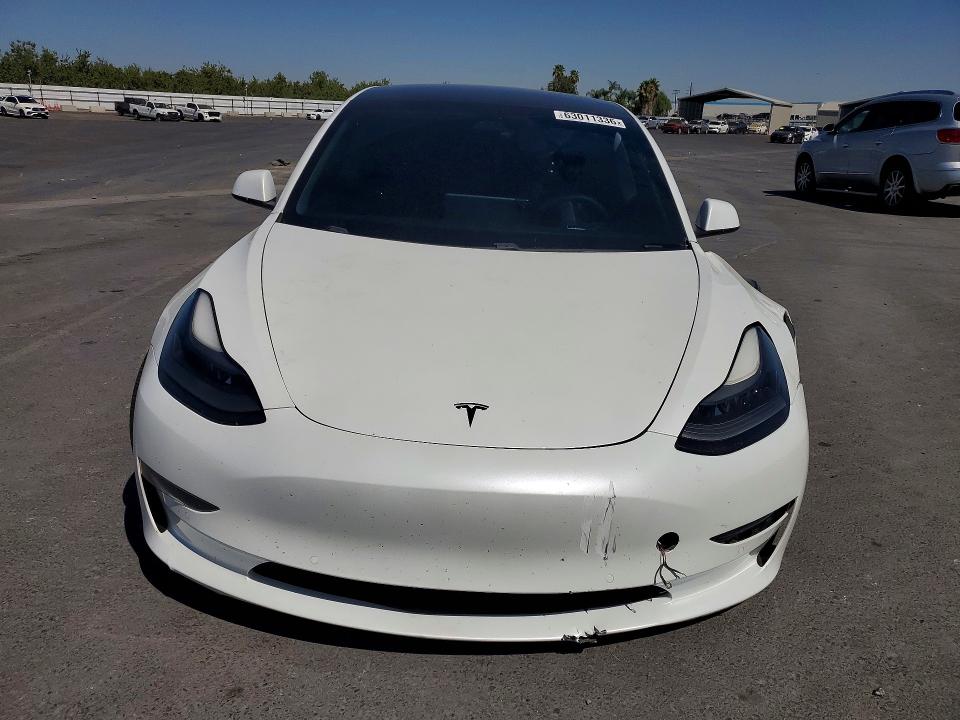 Продаж на аукціоні авто 2021 Tesla Model 3, vin: 5YJ3E1EA0MF921969, номер лоту: 63011336