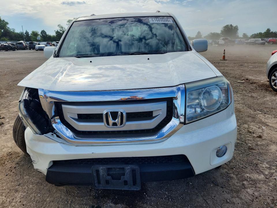 61689596 :رقم المزاد ، 5FNYF4H94BB018050 vin ، 2011 Honda Pilot مزاد بيع