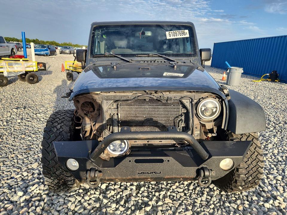 61097696 :رقم المزاد ، 1C4BJWDG1JL859226 vin ، 2018 Jeep Wrangler Unlimited مزاد بيع
