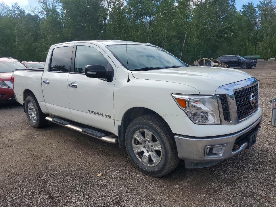 61354156 :رقم المزاد ، 1N6AA1EJ6JN528491 vin ، 2018 Nissan Titan مزاد بيع