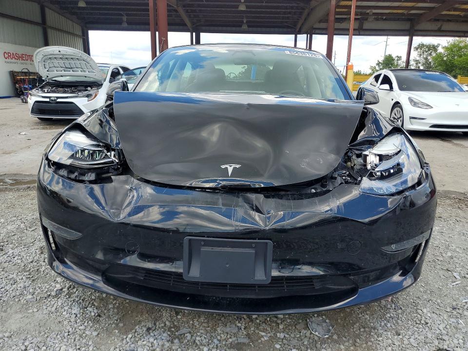 Продажа на аукционе авто 2023 Tesla Model 3, vin: 5YJ3E1EAXPF452832, номер лота: 85636125