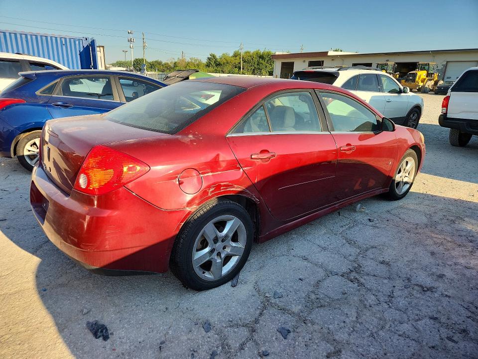 60987356 :رقم المزاد ، 1G2ZJ57B294270799 vin ، 2009 Pontiac G6 مزاد بيع