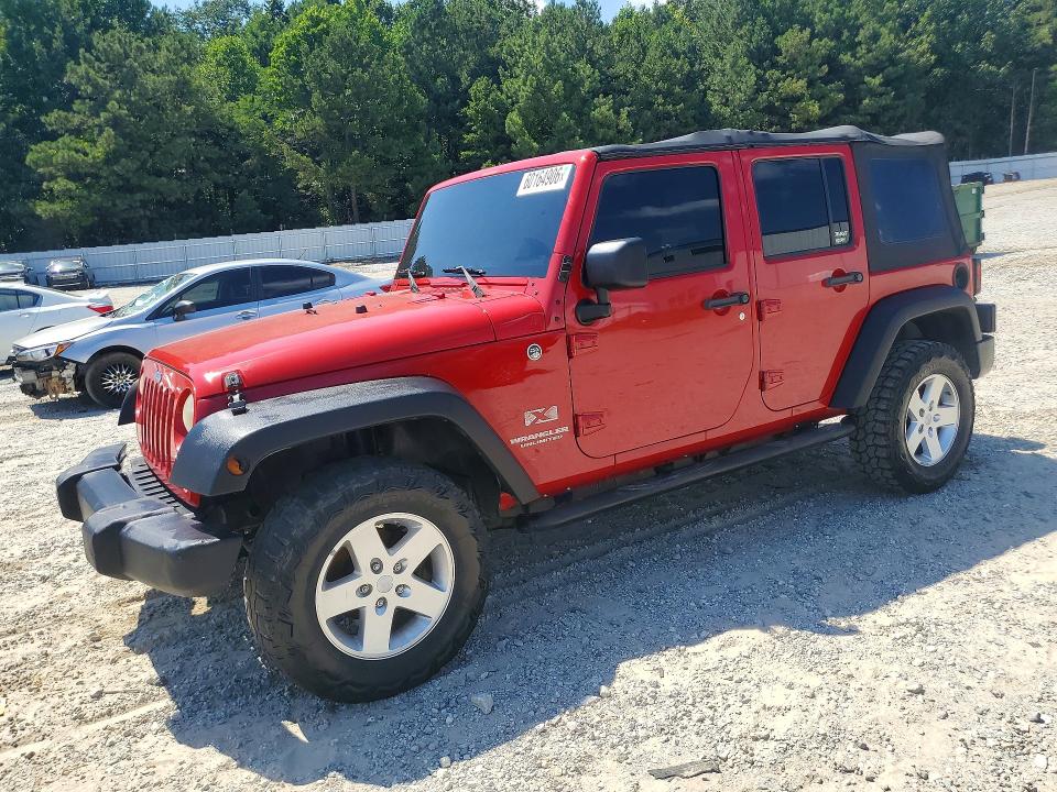 2009 Jeep Wrangler Unlimited მანქანა იყიდება აუქციონზე, vin: 1J4GA39149L767302, აუქციონის ნომერი: 60164906
