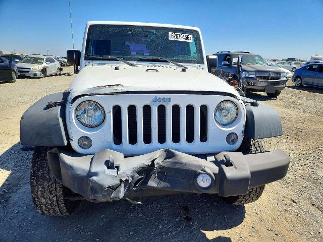 Auction sale of the 2015 Jeep Wrangler, vin: 1C4AJWAG8FL613488, lot number: 62679456